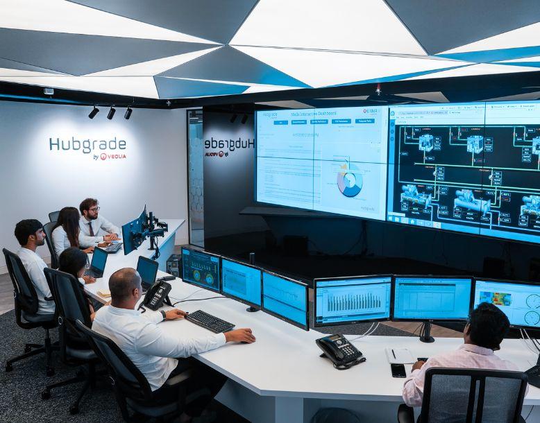 Veolia employees working in a Hubgrade management center