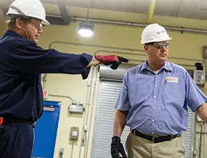 Rodney Lance is shown with fellow Veolia team member Pat Blatter