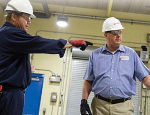 Rodney Lance is shown with fellow Veolia team member Pat Blatter