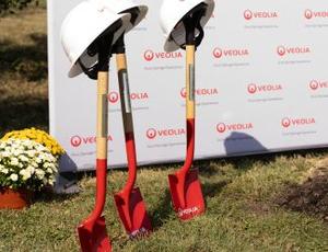 Veolia ceremonial shovels are seen, ready to symbolize the beginning of a significant reforestation project at Veolia Gum Springs