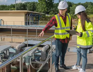 Wastewater professionals at a site. 