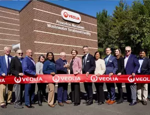 Veolia's team at Princeton Meadows cutting a ribbon.