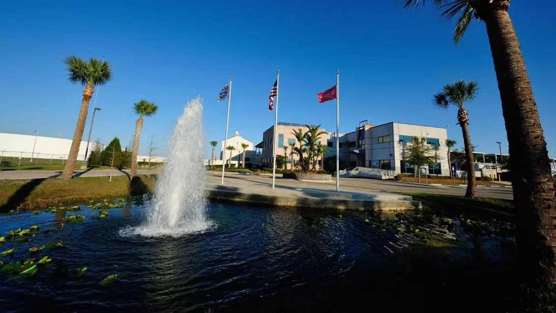 The Tampa Bay facility is seen with a water fountain in the foreground