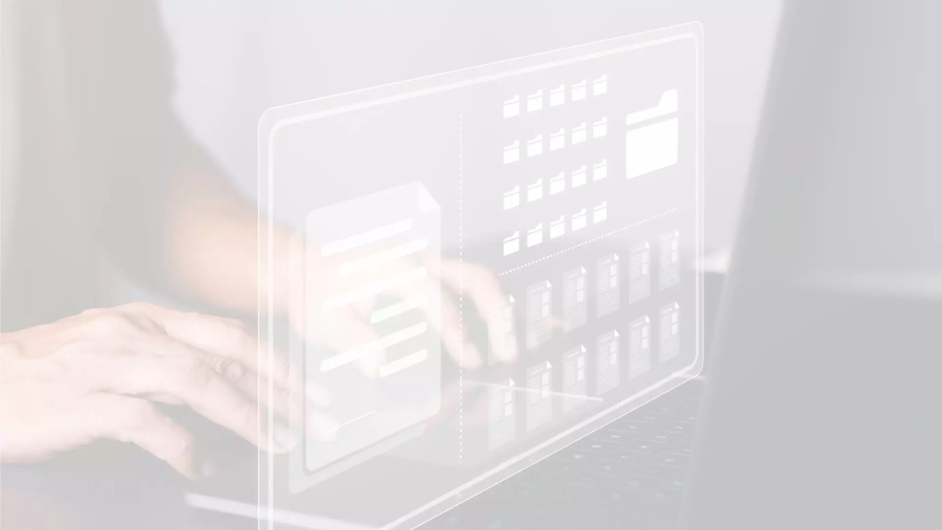 A faded background shows hands typing on a keyboard and a dashboard of a computer desktop