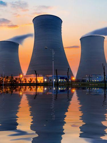 A power plant cooling towers are seen beyond the water treatment area