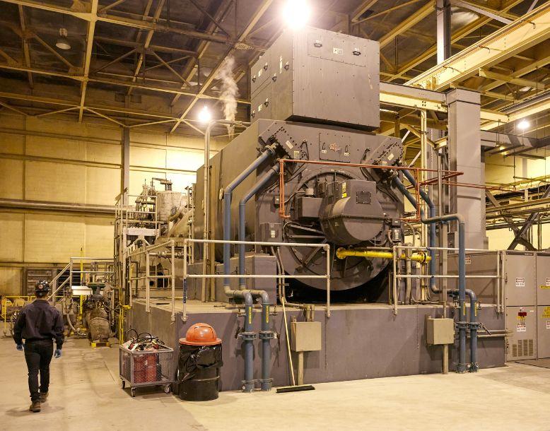 A turbine is seen at a facility with Veolia